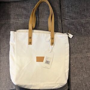 White Cozy earth Tote with Tan Leather Handles by (unknown)